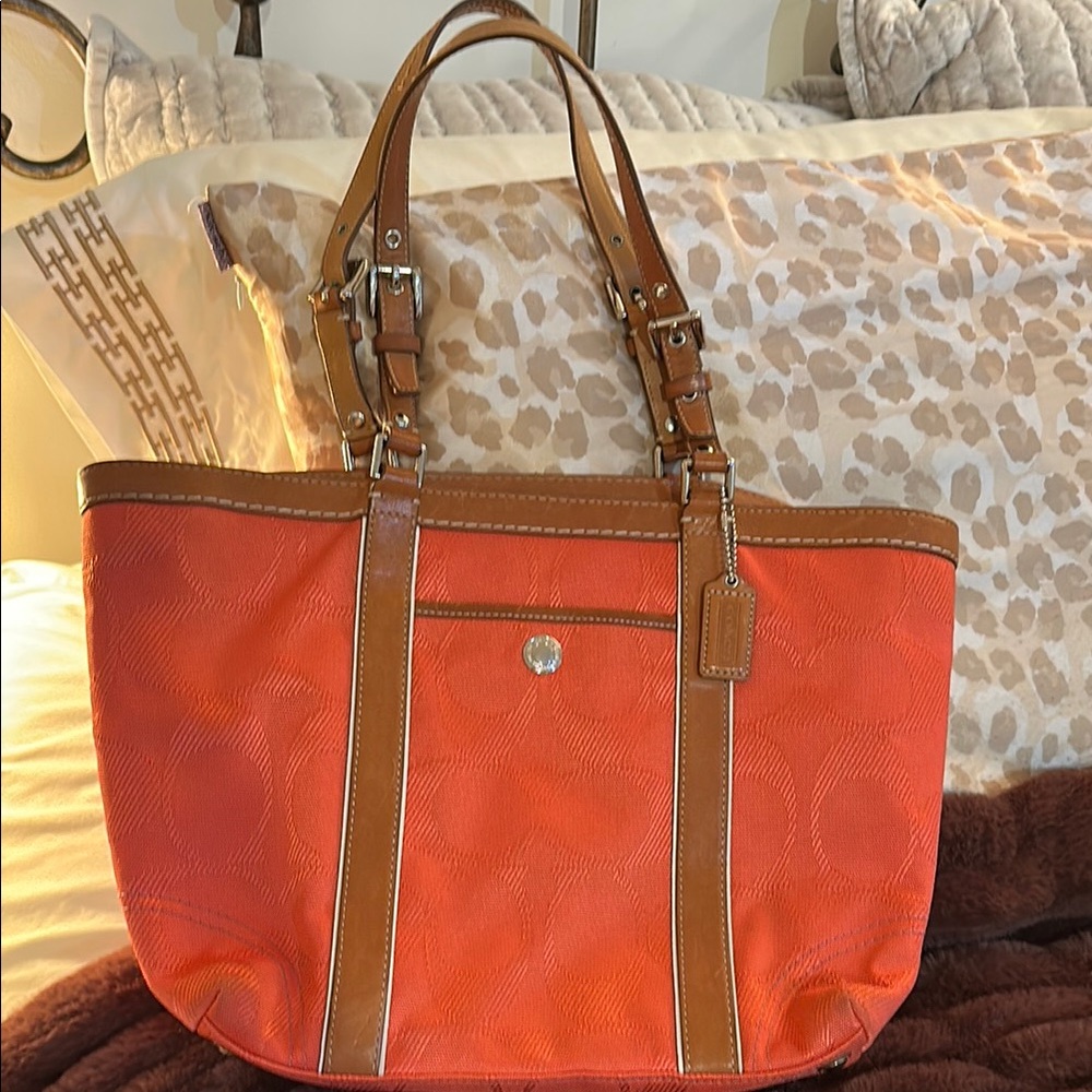 Coach brand orange tote bag